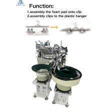 Máquina automática de producción de perchas.