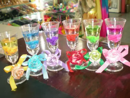 A scented candle in a glass glass