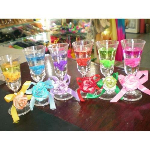 A scented candle in a glass glass