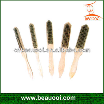wooden handle of steel brush