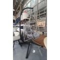 Silla tipo huevo colgante para exteriores con cojín gris