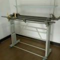 Machine à tricoter à plat à la main
