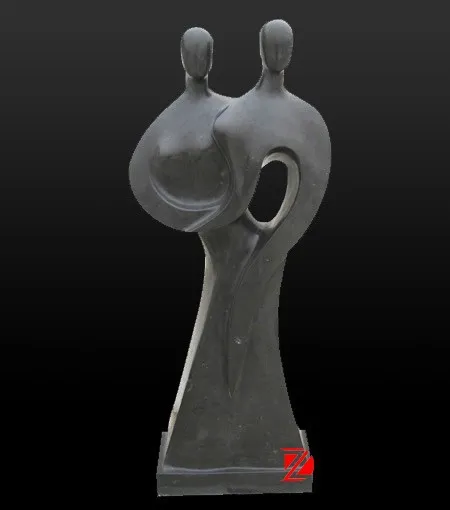 stone abstract couple statue
