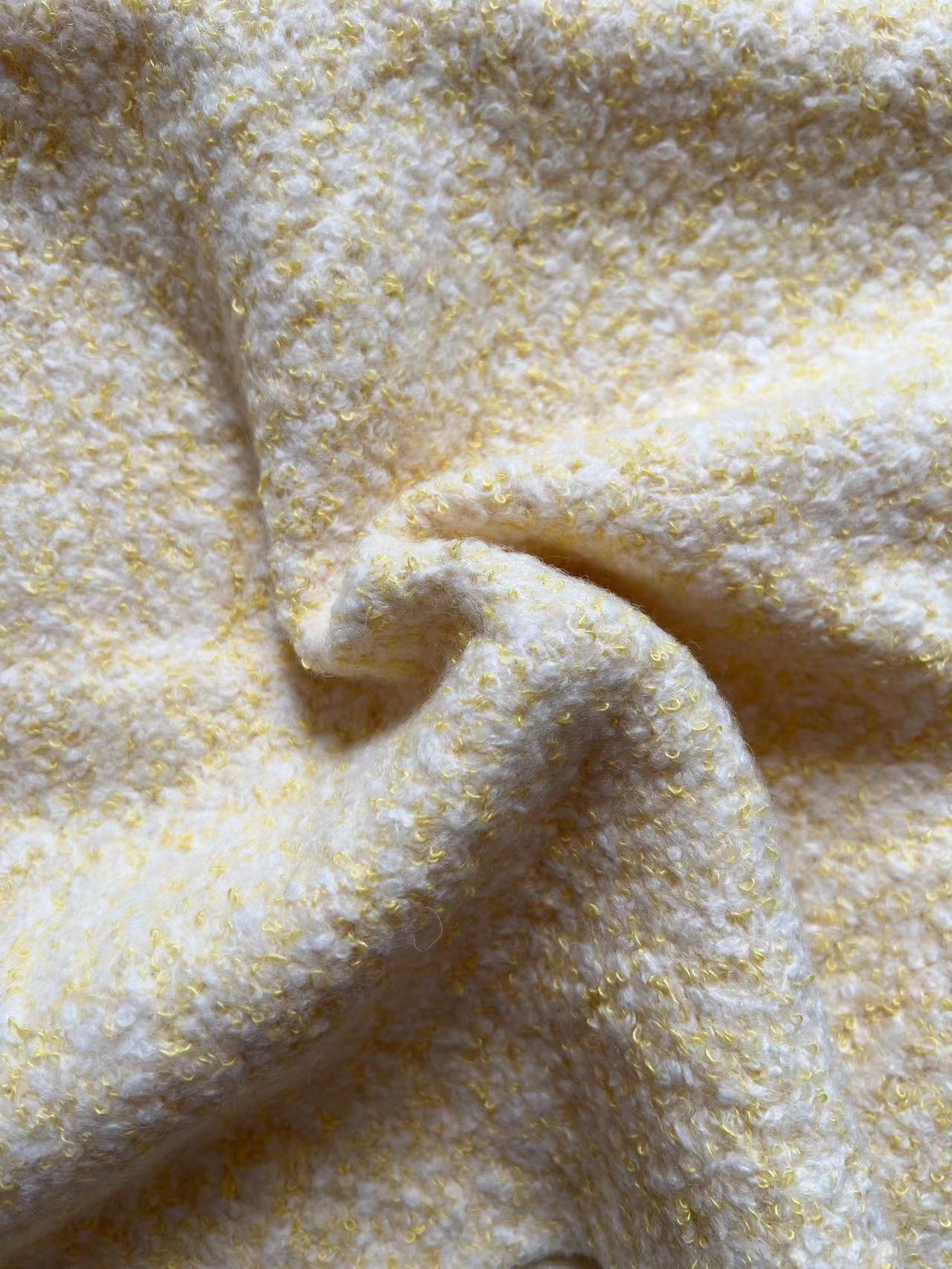 Knitted boucle wool polyester fabric for melange colours