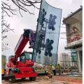 instalador de vidrio en forma de arco con Manitou Aerocar