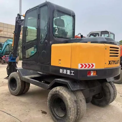 Affordable Second-Hand Xinyuan 75W Wheel Excavator with Wood Grabber for Sale