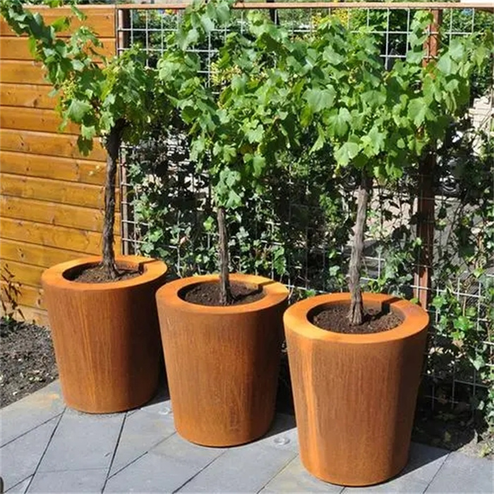 corten steel planter hanging on the wall