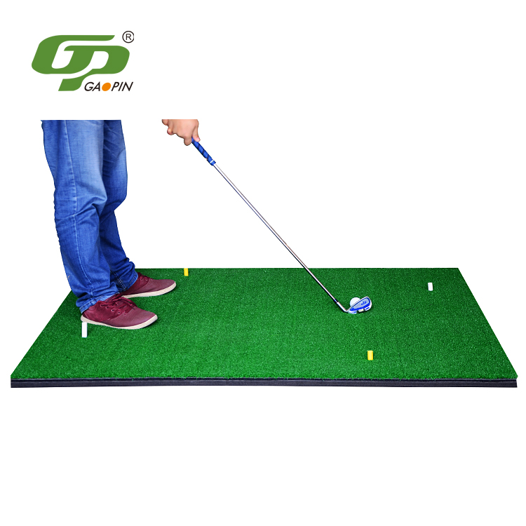 Golf Rubber tee on driving rang mat Golf Rubber tee on driving rang mat