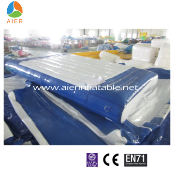 Inflatable base connection for floating water park