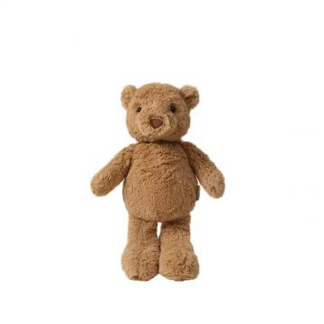 Les enfants de l&#39;ours brun dorment avec un jouet en peluche confortable