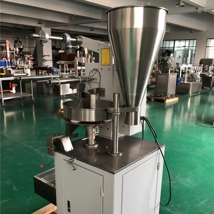 Automatic triangle bag of Tea packaging machine or Peanut or Coffee packaging machine price