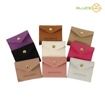 Portable slim jewelry storage pouch with snap button
