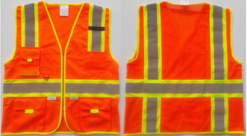 Orange reflective safety vest tape contrasting material