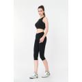 Ladies Yoga Pants Black Body-hugging Mid-length Yoga Tights Supplier