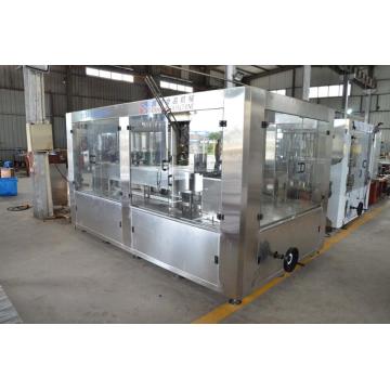 Filling and sealing machine for cans