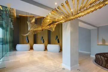 Entryway large wavy gold bubble glass chandelier