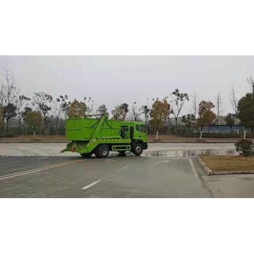 Swept-body refuse collector swing arm garbage truck