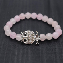 Pulsera de piedras preciosas elástica y cuentas redondas de cuarzo rosa de 8 mm con una pieza de aleación de búho Diamante