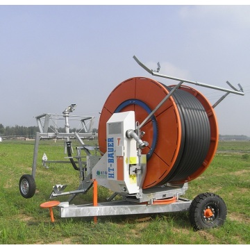 Self watering garden hose reel irrigation system