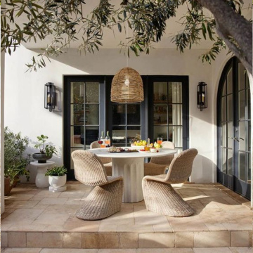 Open-Air B&B Hotel: Courtyard Teak Table and Rattan Chairs in Leisure Garden
