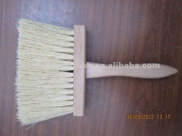 Wall brush with wooden handle