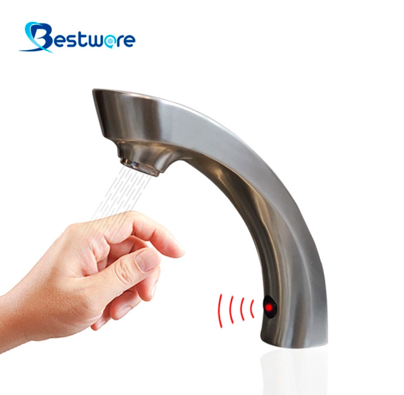 Auto-sensing touch free sink faucet