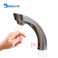 Auto-sensing touch free sink faucet