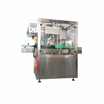 Sparkling Wine / Champagne Lining Machine" 

However, considering common terminology and to improve searchability, you might want:

"Sparkling Wine / Champagne Capping Machine" 

This assumes "ligating" was meant to refer to a capping or sealing process. 