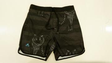 Striped men's beach shorts with tiger print