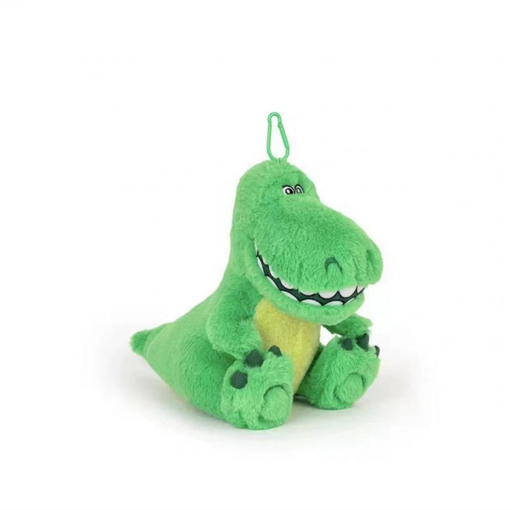 Bolsa de dinosaurio verde sentado colgando peluche juguete
