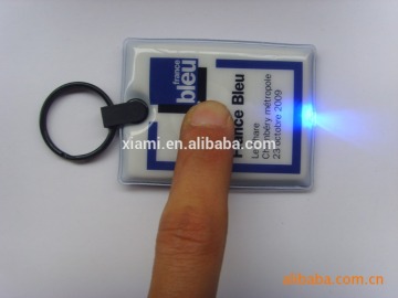 bulk prodution printed words printing pvc flashlight keyring