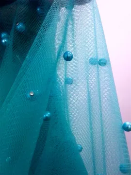 Nail bead knit textile