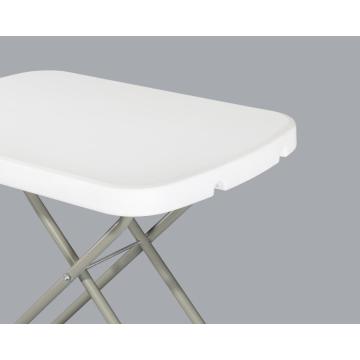 pequena mesa dobrável de granito branco atacado