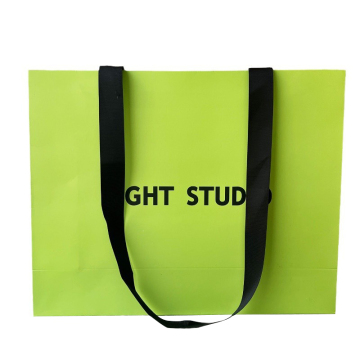 Paper luxury bag with ribbon handle