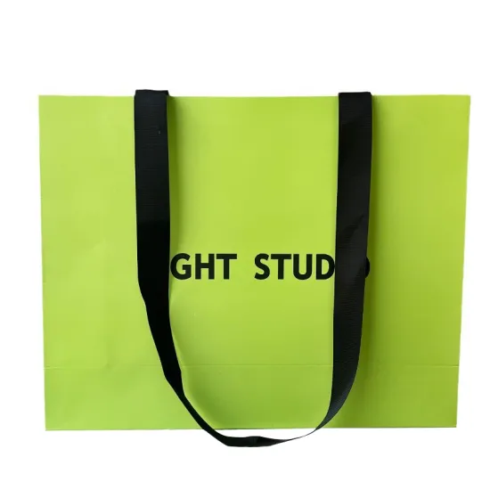 Paper luxury bag with ribbon handle