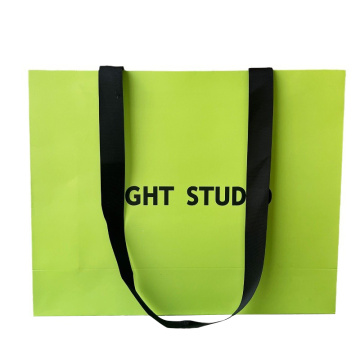 Paper luxury bag with ribbon handle