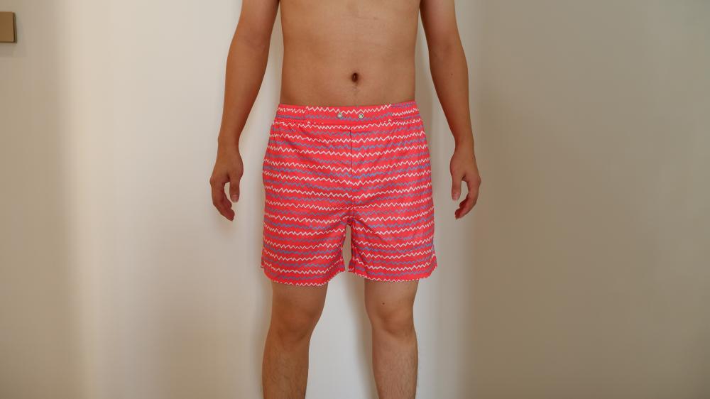 Shorts de praia masculinos corrugados rosa