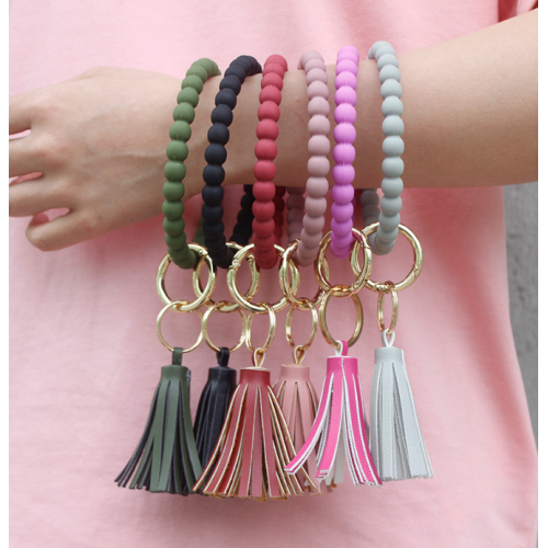 Aangepaste siliconen kralen Keychain -armband met kwast