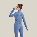 Top da running da donna con zip integrale e pollice