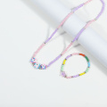 Bracelet de collier de perle en céramique de licorne appartenant aux filles