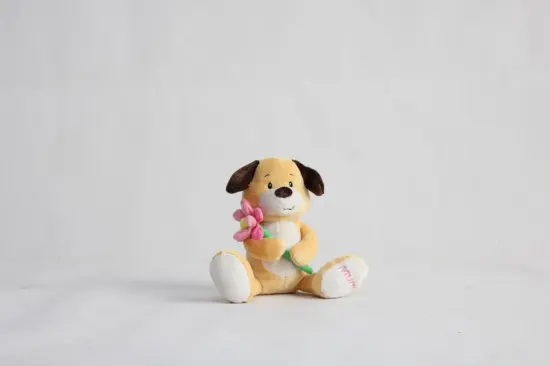 Super soft material holding flowers on ears stuffed dog doll