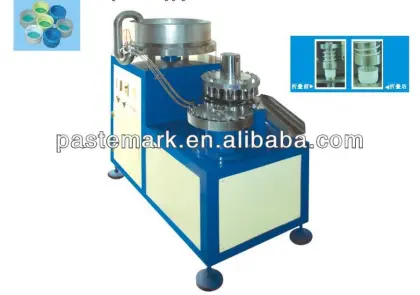 Cap notching machine