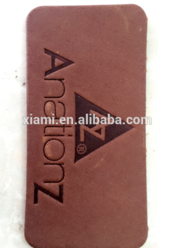 mass production debossed triangle top layer embossed leather label