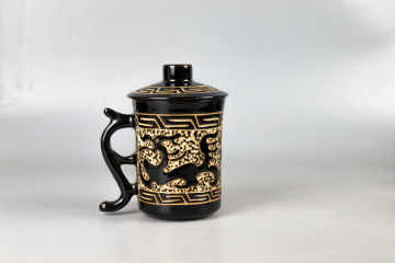 Jizhou kiln flower picking dragon pattern boss cup