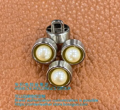Precious metal buttons the whisper of luxury of metal buttons inlaid with pearls