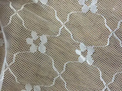 Jacquard lace warp knitting machine