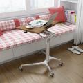 Portable height adjustable bed table