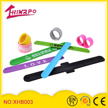 2014 promotional silicone wrist bands custom logo rubber slap band
