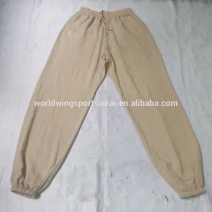Unisex plain beige with 2 side pockets and drawstring on front Taiji bottoms