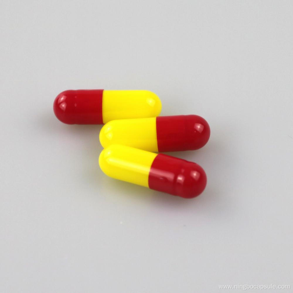 Size 0 red yellow capsules